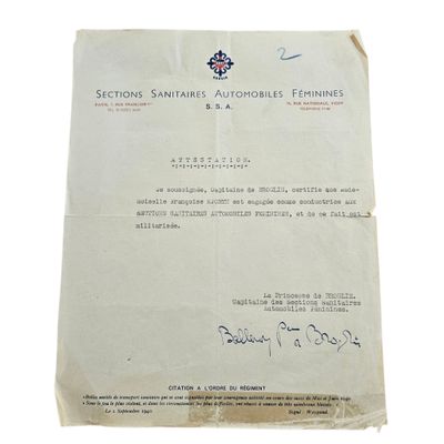 a close up of a piece of paper on a white surface