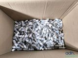 a cardboard box filled with many different types of batteries