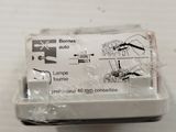 a plastic container with a piece of paper on it