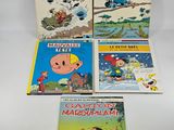 four children ' s books, including the adventures of tintintintin and the adventures of tintintin