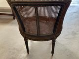 a chair that is sitting in the middle of a living room