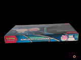 a box of pokemon toys on a black background