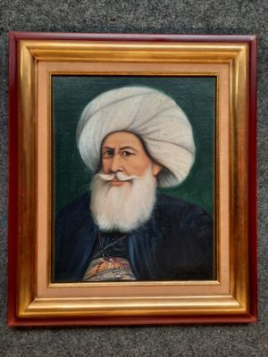 un vieux portrait représentant un homme portant un turban blanc et une barbe