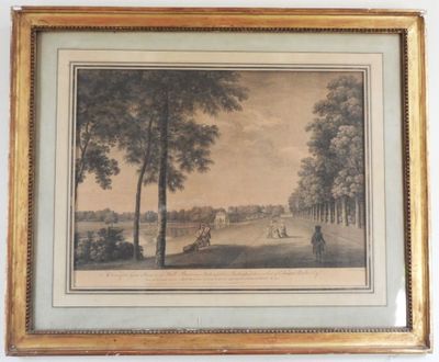 a framed picture of a landscape with trees and a man on a horse