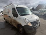 a white van that is parked in a parking lot