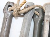 a lot of wrenches that are tied up together