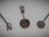 three different types of tools are displayed on a white surface