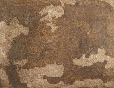 a close up of a brown and white map on a wall