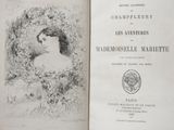an open book with a drawing of a woman in a dress