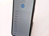 a cell phone that has a broken screen on it