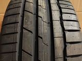 a close up of a tire on a cardboard box