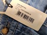 the label on the back of a pair of blue jeans