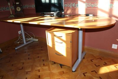 an image of a desk with a computer on top of it