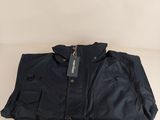 the jacket is black and has a tag on it