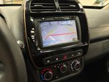 the dashboard of a car with a gps device in the center