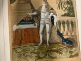 a drawing of a man in a suit and a peacock