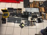 a lot of electronic equipment that are on the floor