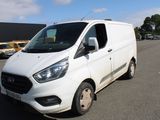 a white van that is parked in a parking lot