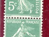 deux timbres représentant une femme et un homme