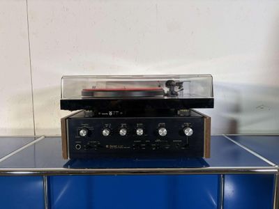 a radio that is sitting on top of a blue table