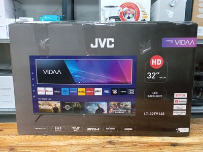 a box of tvs sitting on a table in a store
