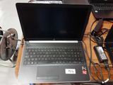 a laptop computer that is sitting on a desk