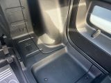 the interior of a vehicle with the door open showing the inside of the vehicle