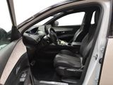 the interior of a car with the door open and the driver ' s seat down