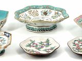 many different types of bowls and bowls sitting on a table