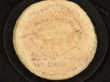 an image of a coin that is on a black surface