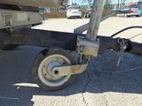 a close up of a boat ' s wheel with a chain attached to it