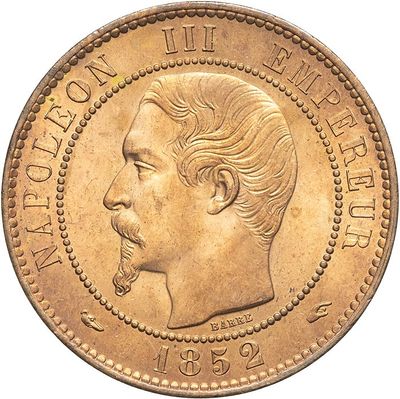 a close up of a coin with a man ' s face on it