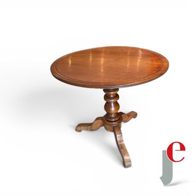 an image of a table with a wooden top and a wooden base