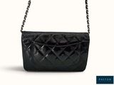 black quilted leather shoulder bag with chain strap
