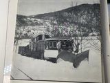 a picture of a train in the snow on the cover of a magazine