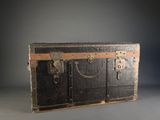 an old trunk that is sitting on a table