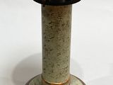 a small table with a lamp on top of it