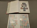 a book with stamps on it sitting on a table