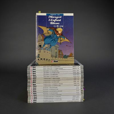 many books stacked on top of each other on a table