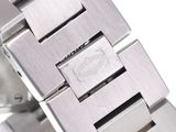 an image of a close up of a watch on a white surface