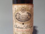 a bottle of wine that is sitting on a table