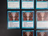 several cards of different characters are displayed on a black surface