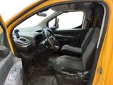a picture of a car with the door open and the driver ' s seat down