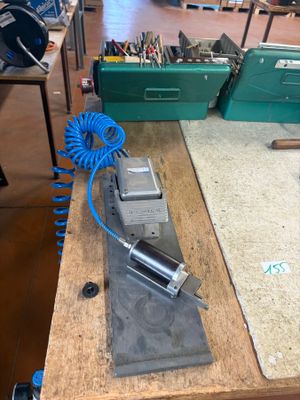an image of a workbench with tools on it
