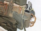 a pile of military items sitting on top of a table