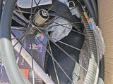 a box with a bicycle wheel inside of it
