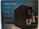 the box of the coffee machine is open on the table