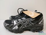 asics gel kayano running shoe with a tag on top of it