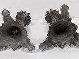 pair of antique cast iron candlesticks with flowers and leaves