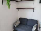 a couch that is in the corner of a room